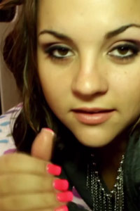 Ashley gives a handjob in pantyhose